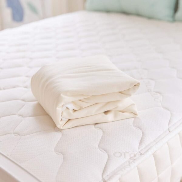 Naturepedic Organic Waterproof Mattress Protector Pad - Washable & Reusable Fitted Stretch Knit Mattress Cover - Highly Absorbent Bed Incontinence Pads - Breathable Fitted Cover for Twin 9"-16" - Image 4