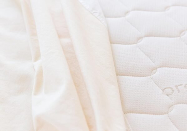 Naturepedic Organic Waterproof Mattress Protector Pad - Washable & Reusable Fitted Stretch Knit Mattress Cover - Highly Absorbent Bed Incontinence Pads - Breathable Fitted Cover for Twin 9"-16" - Image 5