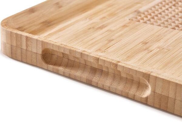 Joseph Joseph Cut & Carve Bamboo Cutting Board with Food Grip and Angled Surface Yellow Large - Image 2
