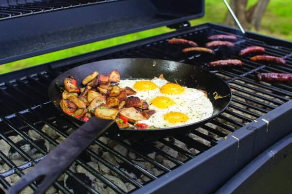 Lodge Pre-Seasoned Carbon Steel Skillet - Use in the Oven, on the Stove, on the Grill, or Over a Campfire - 12 Inch - Image 4